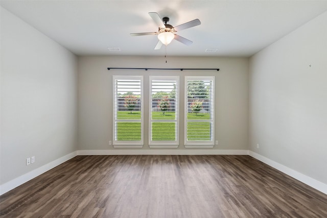 7709 Potter St, Rowlett, TX 75089 - empty room featuring ceiling fan and dark wood finished floors