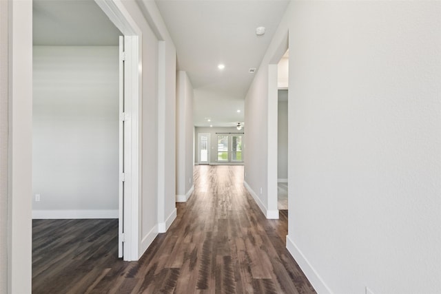 7709 Potter St, Rowlett, TX 75089 - hallway with dark wood-style floors and recessed lighting