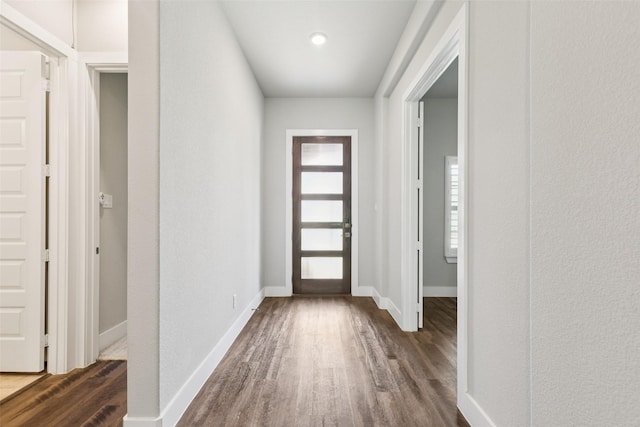 7709 Potter St, Rowlett, TX 75089 - foyer with dark wood-type flooring and a textured wall