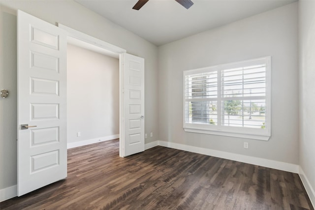7709 Potter St, Rowlett, TX 75089 - unfurnished bedroom featuring dark wood-style flooring and ceiling fan