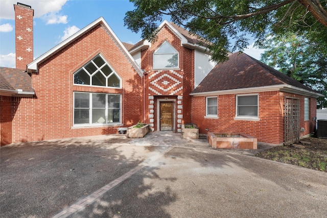 308 Westlane Cir, Woodway, TX 76712 - view of front of property featuring brick siding and a shingled roof
