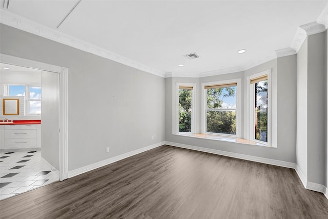 308 Westlane Cir, Woodway, TX 76712 - spare room with crown molding, dark wood-style flooring, and recessed lighting