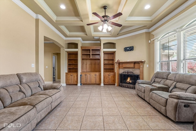 2018 Honeytree Trl, Haughton, LA 71037 - living area with light tile patterned floors, ceiling fan, crown molding, a premium fireplace, and arched walkways
