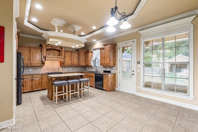 2018 Honeytree Trl, Haughton, LA 71037 - kitchen with crown molding, black appliances, light tile patterned floors, decorative backsplash, and a chandelier