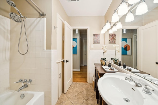 1147 N Windomere Ave, Dallas, TX 75208 - full bathroom with tile patterned flooring, bathing tub / shower combination, and wainscoting