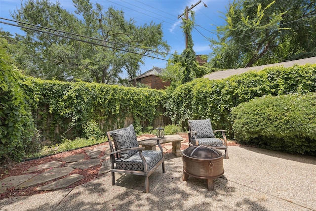 1147 N Windomere Ave, Dallas, TX 75208 - view of patio / terrace featuring an outdoor fire pit