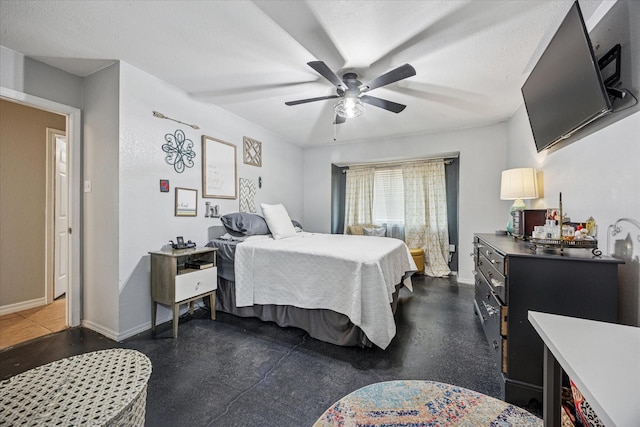4201 Ravenhill Ln, Arlington, TX 76016 - bedroom featuring baseboards and ceiling fan
