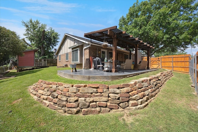 4201 Ravenhill Ln, Arlington, TX 76016 - back of house featuring a fenced backyard, brick siding, board and batten siding, and a patio