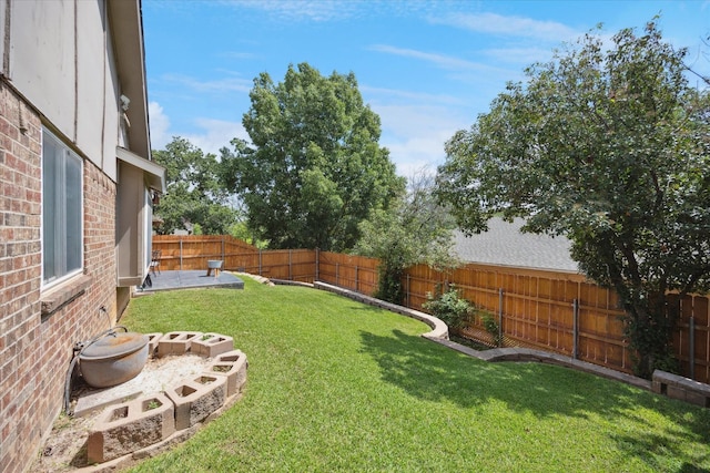 4201 Ravenhill Ln, Arlington, TX 76016 - fenced backyard with a patio area