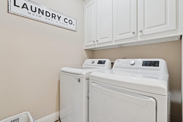 14845 Belclaire Ave, Aledo, TX 76008 - laundry room with washing machine and dryer and cabinet space