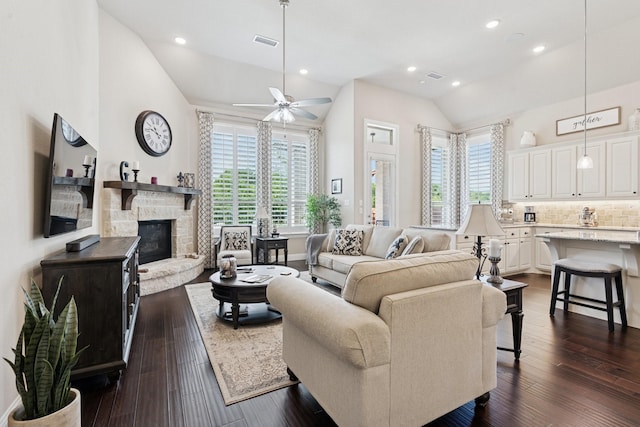 14845 Belclaire Ave, Aledo, TX 76008 - living room featuring lofted ceiling, a fireplace, dark wood finished floors, ceiling fan, and recessed lighting