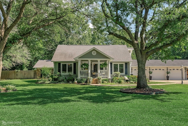9900 Myrtis Texas Line Rd, Vivian, LA 71082 - view of front of property featuring a porch, an attached garage, concrete driveway, and roof with shingles