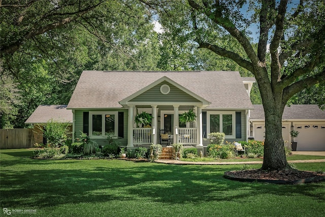 9900 Myrtis Texas Line Rd, Vivian, LA 71082 - view of front of property with a porch, a shingled roof, and an attached garage