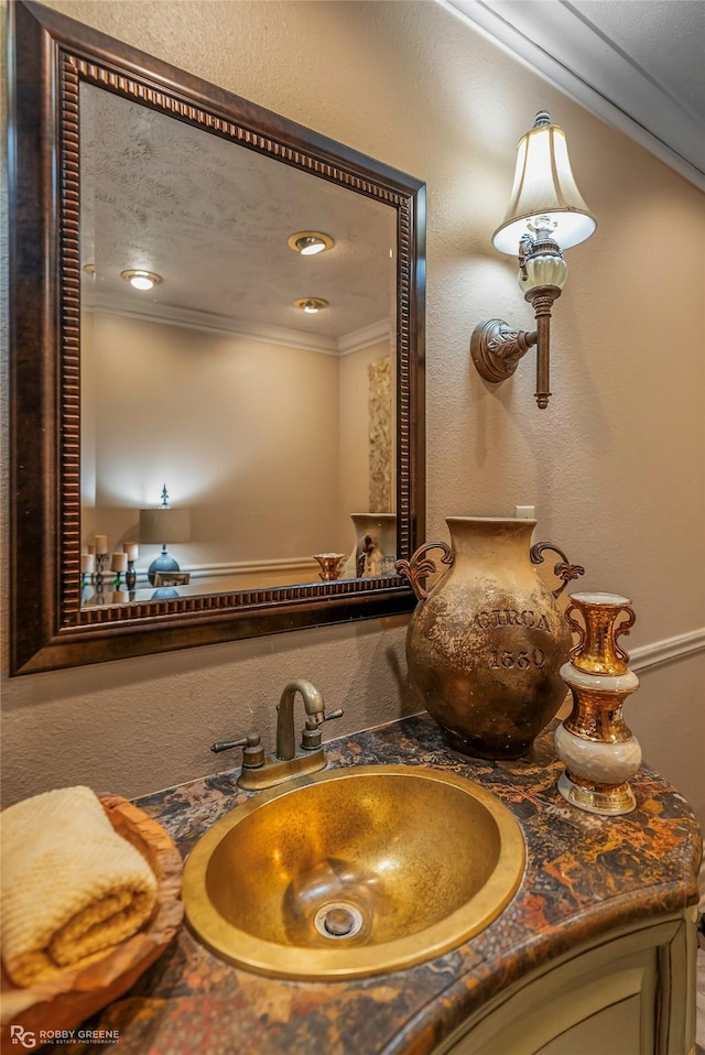9900 Myrtis Texas Line Rd, Vivian, LA 71082 - bathroom featuring ornamental molding and vanity