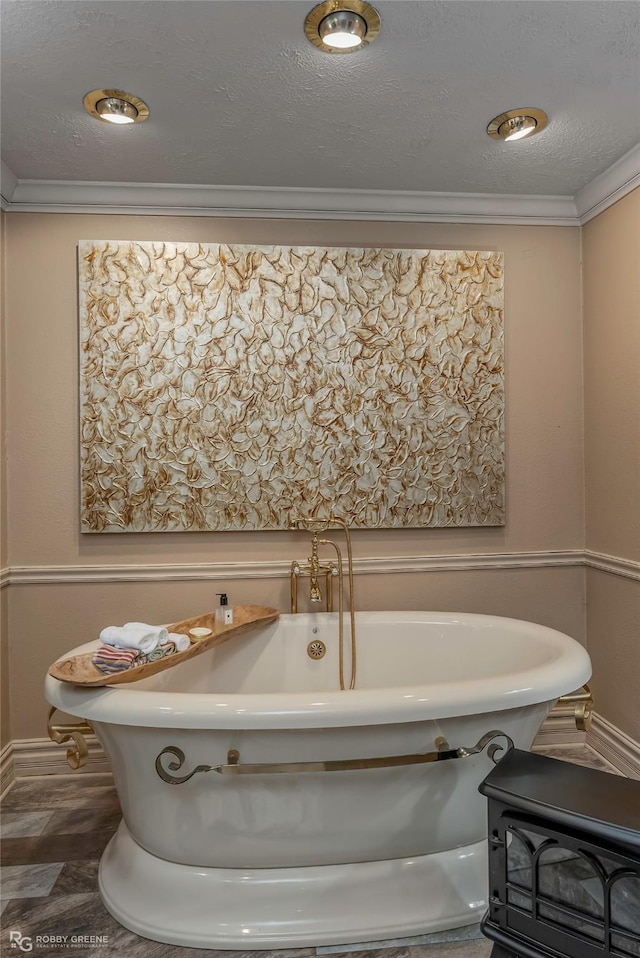 9900 Myrtis Texas Line Rd, Vivian, LA 71082 - bathroom with a freestanding tub and crown molding