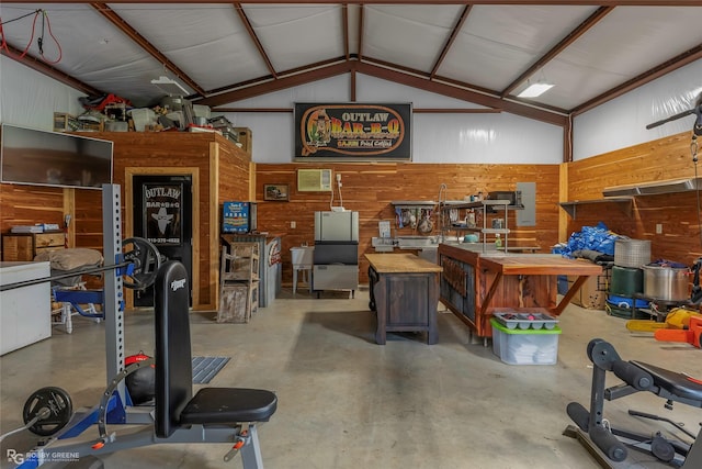9900 Myrtis Texas Line Rd, Vivian, LA 71082 - garage featuring a workshop area and wood walls