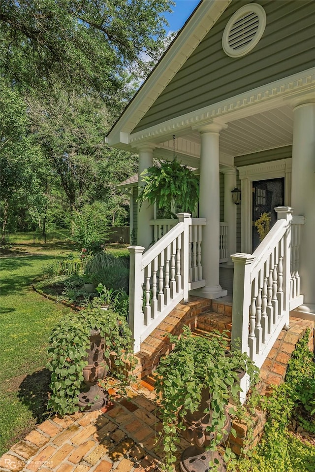 9900 Myrtis Texas Line Rd, Vivian, LA 71082 - doorway to property with a porch and a yard
