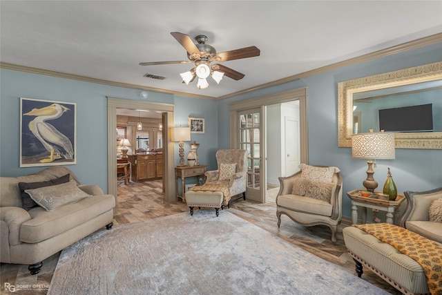 9900 Myrtis Texas Line Rd, Vivian, LA 71082 - living area featuring ceiling fan, crown molding, and wood finished floors