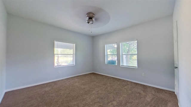 2700 S Jones St, Fort Worth, TX 76104 - carpeted spare room with ceiling fan and baseboards