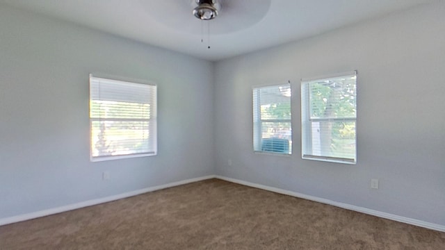 2700 S Jones St, Fort Worth, TX 76104 - carpeted spare room featuring a ceiling fan and baseboards