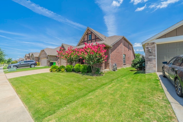 1621 Ranch Trail Rd, Aubrey, TX 76227 - view of front of home featuring a front yard, brick siding, and driveway