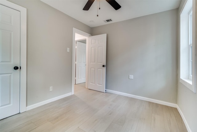 331 Andover Dr, Mesquite, TX 75149 - unfurnished bedroom featuring light wood finished floors and a ceiling fan