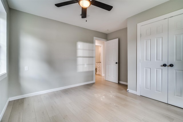 331 Andover Dr, Mesquite, TX 75149 - unfurnished bedroom with light wood-style flooring, a closet, and a ceiling fan