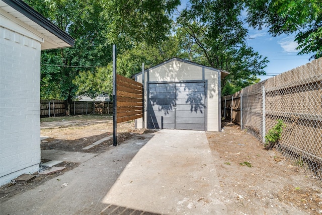 331 Andover Dr, Mesquite, TX 75149 - detached garage featuring driveway and a shed