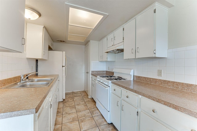 3000 Lambert Dr, Mesquite, TX 75150 - kitchen featuring white appliances, tasteful backsplash, white cabinets, and under cabinet range hood