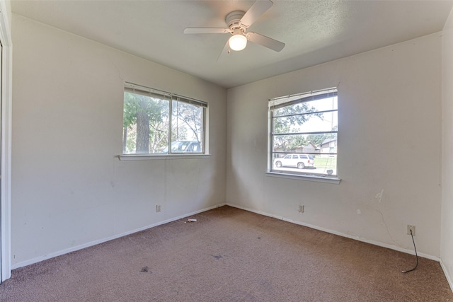 3000 Lambert Dr, Mesquite, TX 75150 - carpeted empty room with healthy amount of natural light and a ceiling fan
