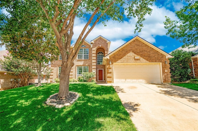 4009 Bickmore Ln, Fort Worth, TX 76244 - traditional-style house with brick siding, an attached garage, a front lawn, and driveway