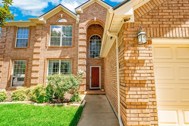 4009 Bickmore Ln, Fort Worth, TX 76244 - property entrance with brick siding and an attached garage