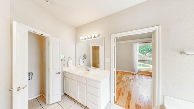 4009 Bickmore Ln, Fort Worth, TX 76244 - bathroom featuring vanity and wood finished floors