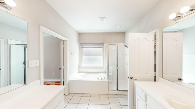 4009 Bickmore Ln, Fort Worth, TX 76244 - full bath with vanity, a shower stall, a bath, tile patterned flooring, and recessed lighting