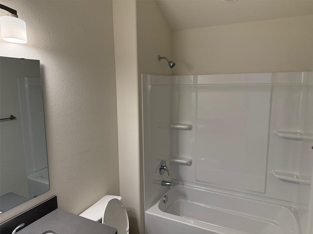 1803 Boxwood Dr, Sherman, TX 75092 - full bath featuring bathtub / shower combination, vanity, and a textured wall