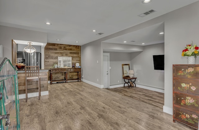 2020 Skylark Dr, Dallas, TX 75216 - living room featuring wood finished floors, recessed lighting, and baseboard heating