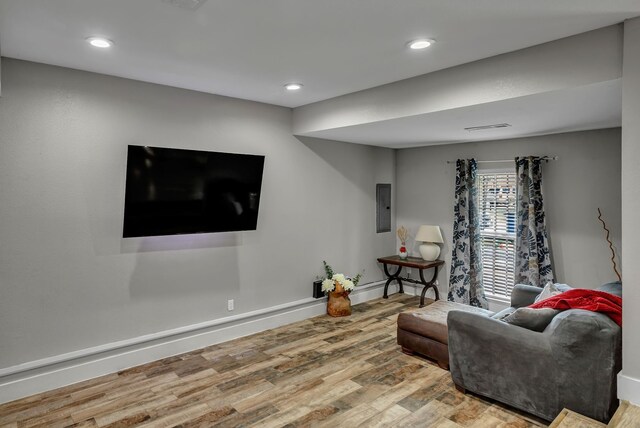 2020 Skylark Dr, Dallas, TX 75216 - living area with electric panel, wood finished floors, and recessed lighting