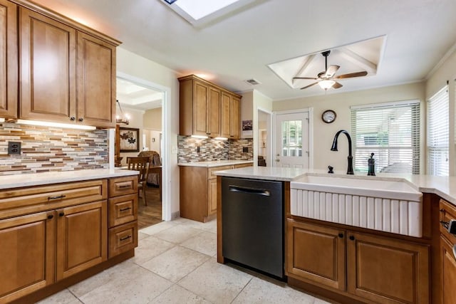 2514 Golden Oaks Dr, Garland, TX 75044 - kitchen with dishwasher, brown cabinets, decorative backsplash, ceiling fan, and light countertops