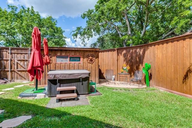 2514 Golden Oaks Dr, Garland, TX 75044 - fenced backyard featuring a hot tub and a patio area