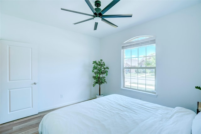 1113 Milfoil Dr, Justin, TX 76247 - bedroom with light wood-style flooring and a ceiling fan
