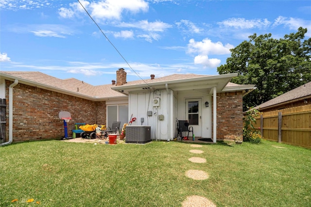 7828 Cardinal Ct 7824, North Richland Hills, TX 76180 - rear view of property with a chimney and brick siding