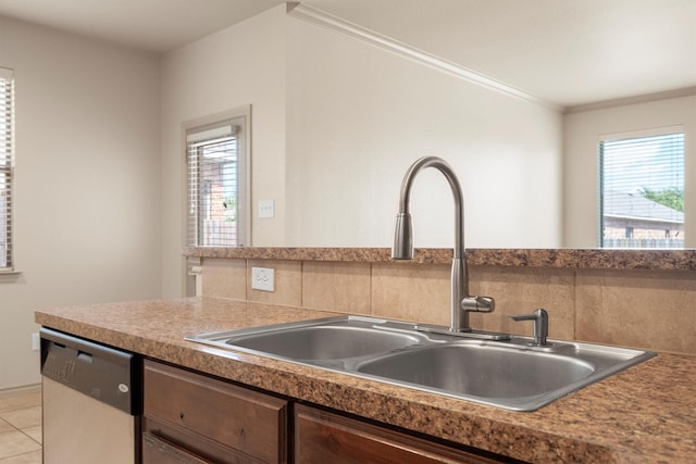 3228 Buckthorn Ln, Denton, TX 76226 - kitchen featuring dishwasher, backsplash, light tile patterned floors, and ornamental molding