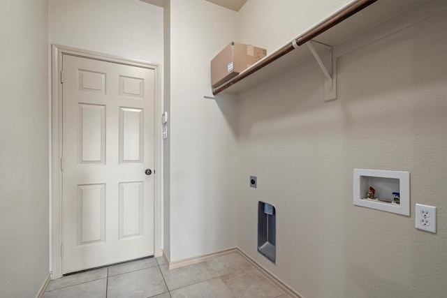 3228 Buckthorn Ln, Denton, TX 76226 - laundry area featuring washer hookup, hookup for an electric dryer, and light tile patterned flooring