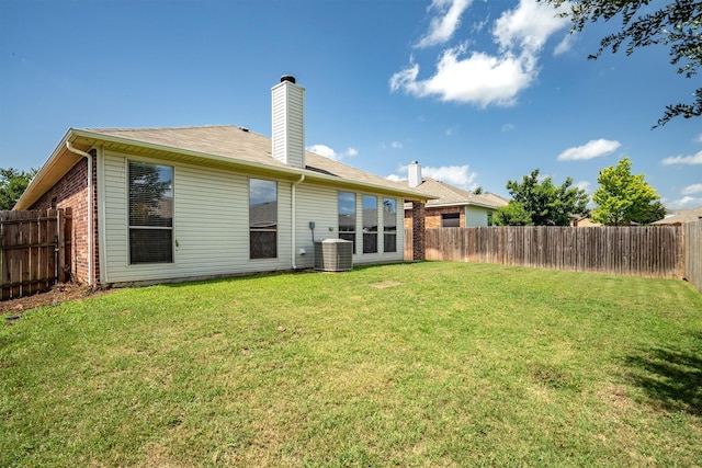 3228 Buckthorn Ln, Denton, TX 76226 - back of house featuring a fenced backyard, a chimney, and brick siding