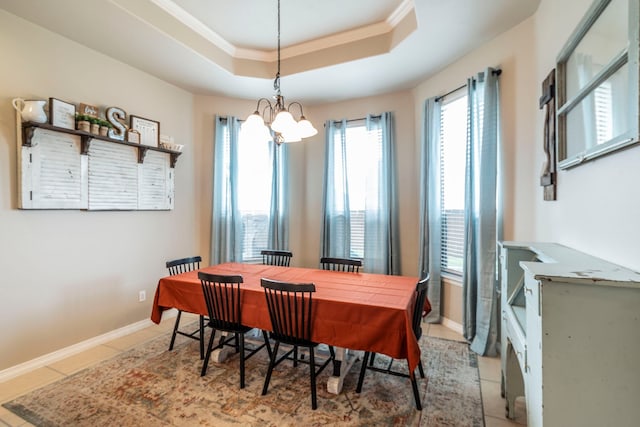 5872 Nathaniel Dr, Fort Worth, TX 76179 - dining space featuring a raised ceiling, light tile patterned floors, a chandelier, and crown molding
