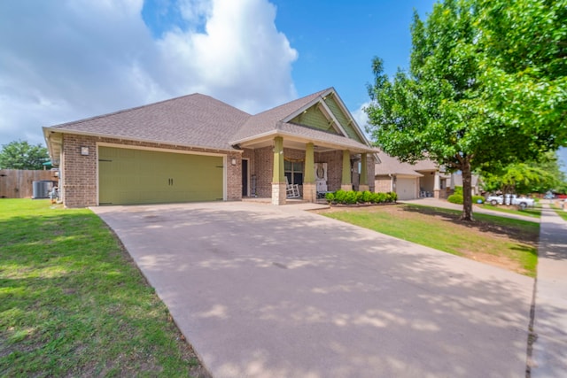 5872 Nathaniel Dr, Fort Worth, TX 76179 - view of front of house with brick siding, a garage, driveway, a porch, and roof with shingles