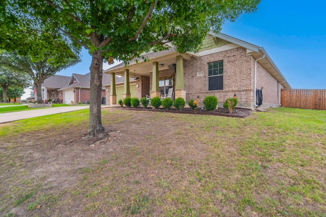 5872 Nathaniel Dr, Fort Worth, TX 76179 - view of front of house with brick siding, concrete driveway, a garage, and covered porch
