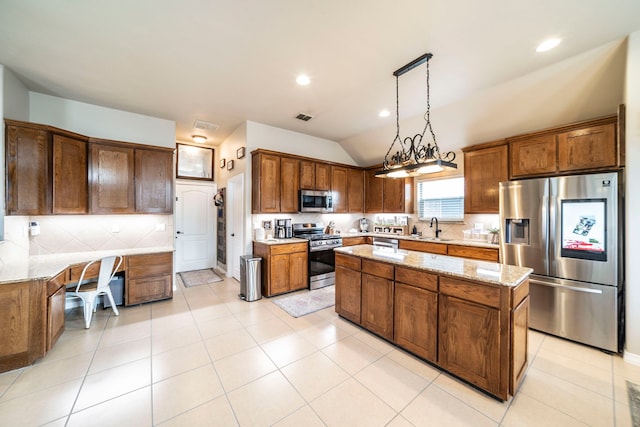 5872 Nathaniel Dr, Fort Worth, TX 76179 - kitchen with stainless steel appliances, a center island, tasteful backsplash, lofted ceiling, and light stone countertops