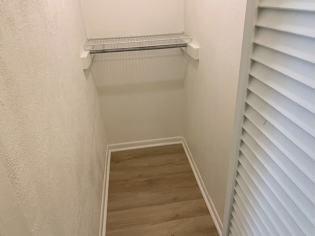 304 Lakeview St, Whitehouse, TX 75791 - walk in closet with wood finished floors