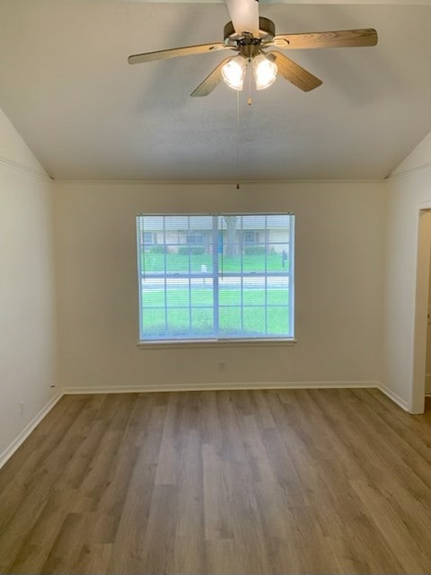 304 Lakeview St, Whitehouse, TX 75791 - spare room with lofted ceiling, wood finished floors, and a ceiling fan